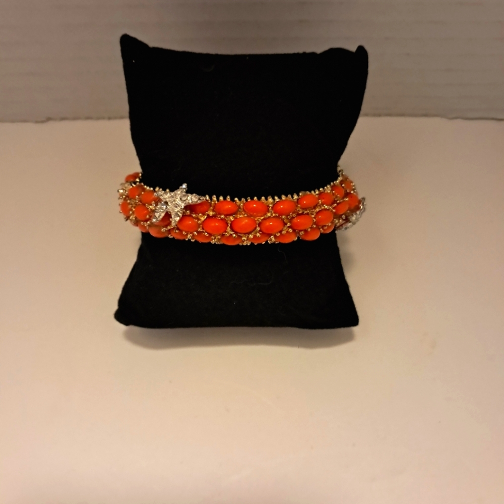 Gold Tone Clamper Bracelet with Coral and Rhinestone Starfish Hinge…